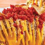 papas rostizadas con chorizo y chips de ajo